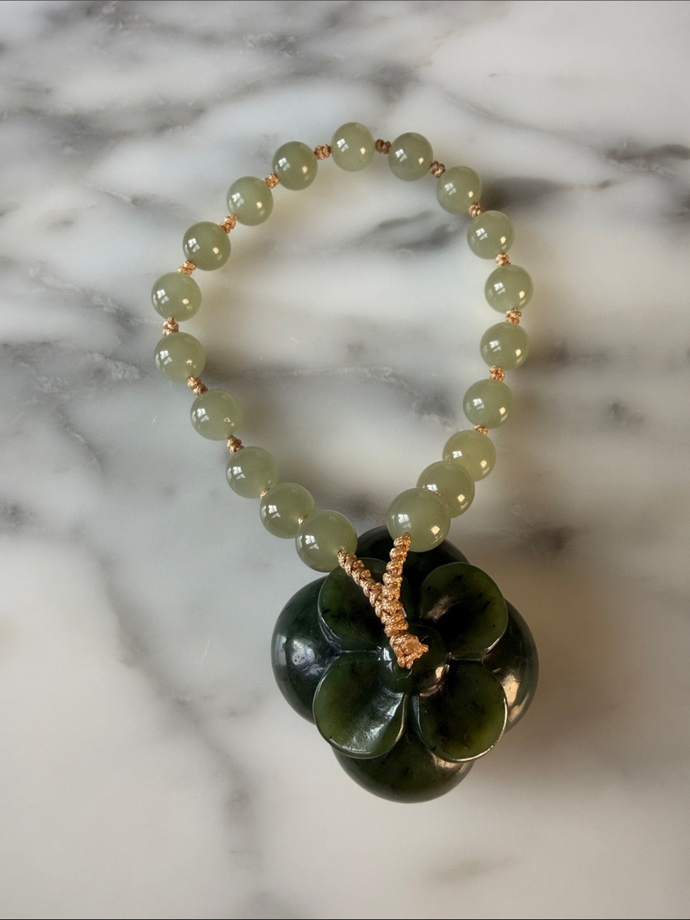 Hand-carved Hetian jade with beads and persimmon fruit( lucky) use as toys.